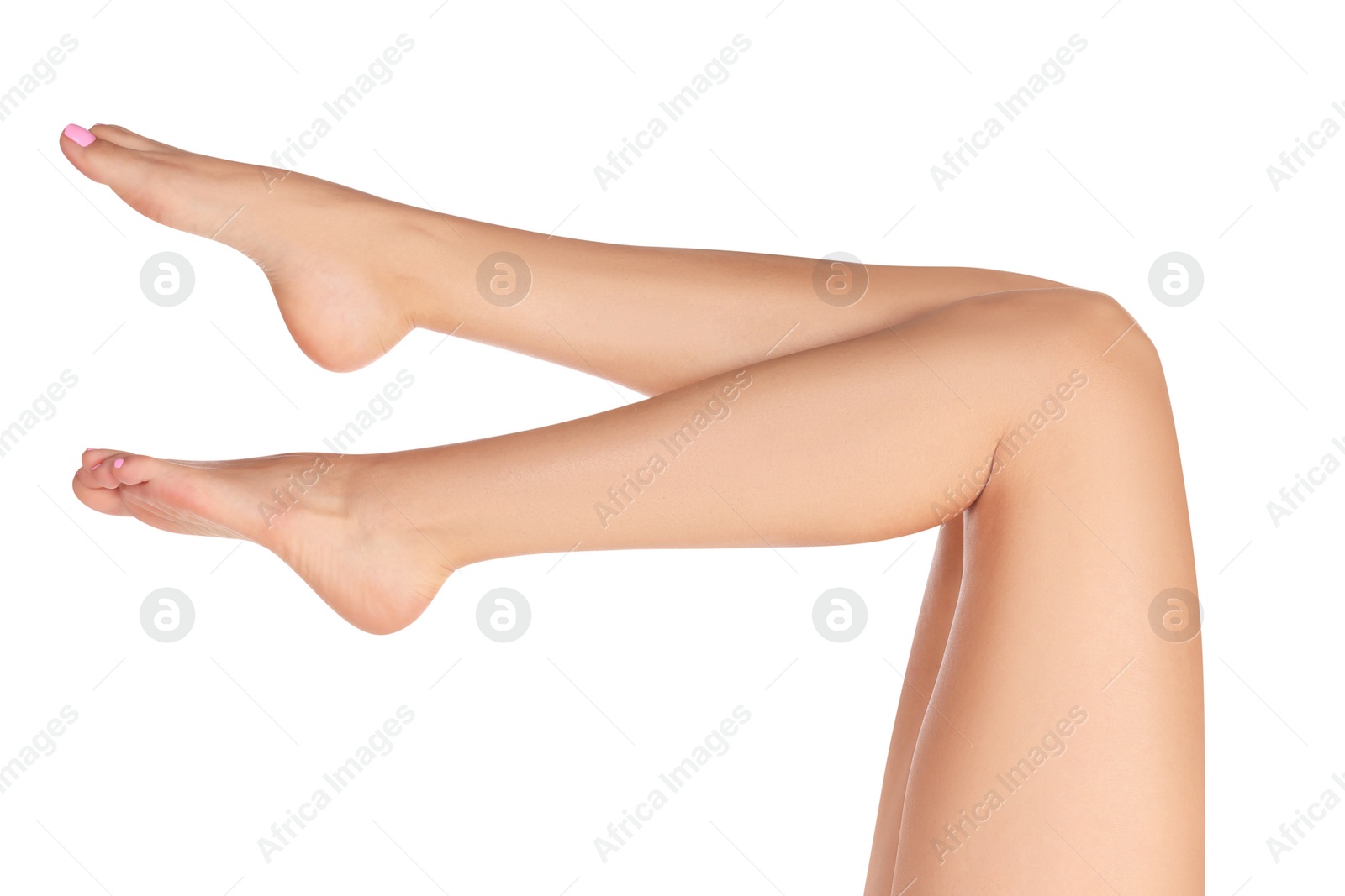 Photo of Woman with beautiful long legs on white background, closeup