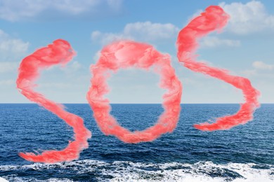 Word SOS made of red smoke and view of sea on sunny day