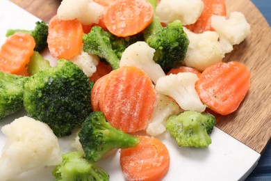 Photo of Mix of different frozen vegetables on table, closeup