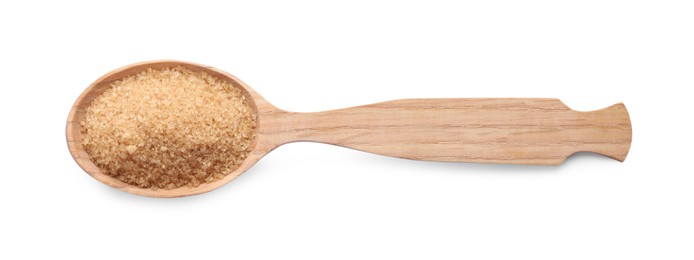 Photo of Brown sugar in wooden spoon isolated on white, top view