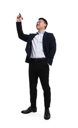 Photo of Businessman in suit with marker writing on white background, low angle view