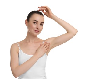 Photo of Beautiful woman showing armpit with smooth clean skin on white background