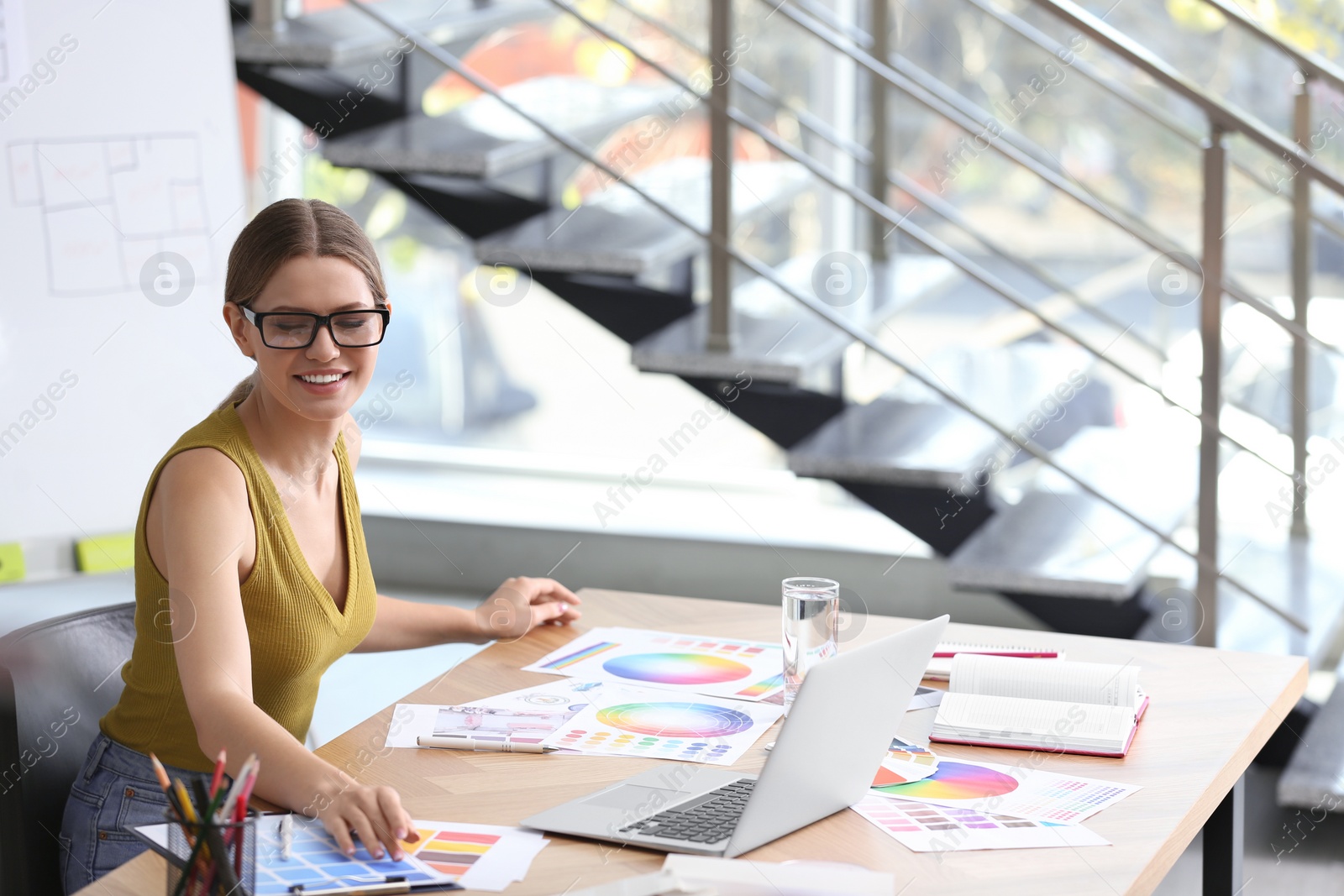 Photo of Professional interior designer at workplace in office