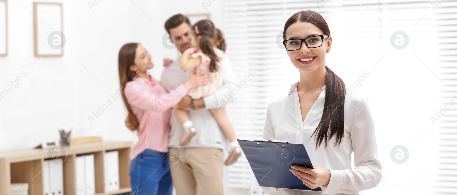 Image of Professional psychologist and happy family in office