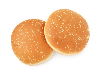 Fresh hamburger buns isolated on white, top view