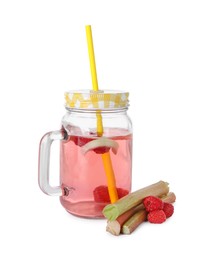 Photo of Mason jar of tasty rhubarb cocktail with raspberry and stalks isolated on white