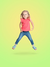 Happy cute girl jumping on color gradient background