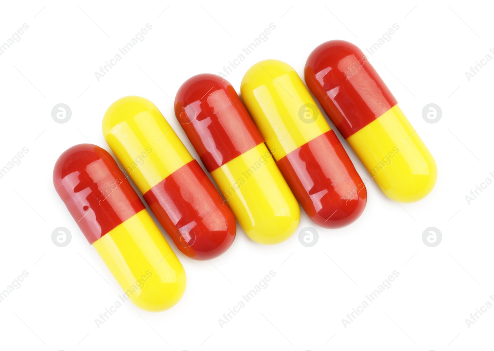 Photo of Many antibiotic pills isolated on white, top view