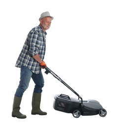 Senior man with modern lawn mower on white background