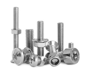 Photo of Different metal bolts and nuts on white background