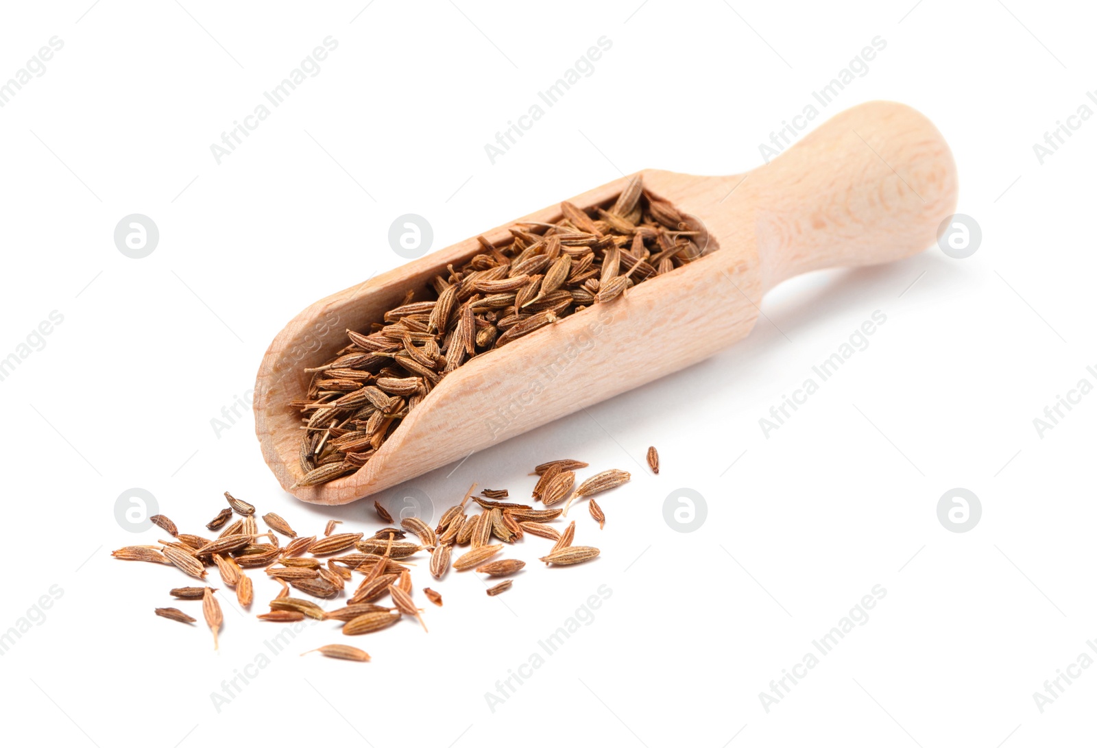 Photo of Scoop of aromatic caraway (Persian cumin) seeds isolated on white