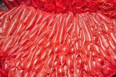 Photo of Texture of fresh ripe grapefruit, closeup view