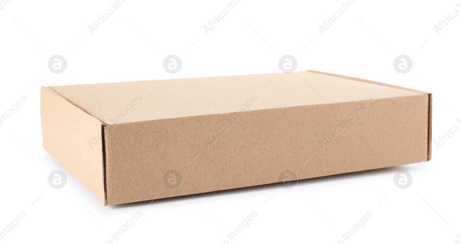 Photo of Closed cardboard box on white background. Mockup for design