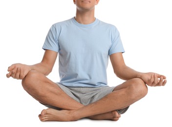 Photo of Man meditating on white background, closeup. Harmony and zen