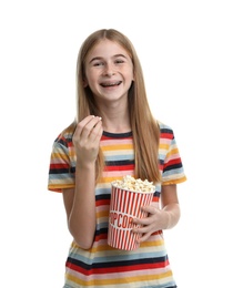 Photo of Teenage girl with popcorn during cinema show on white background