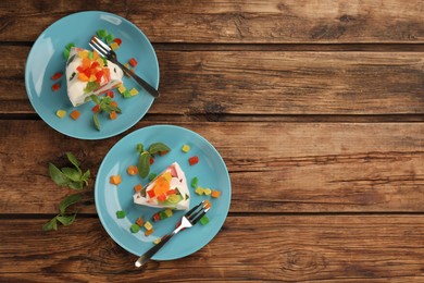 Delicious broken glass jelly dessert on wooden table, flat lay. Space for text