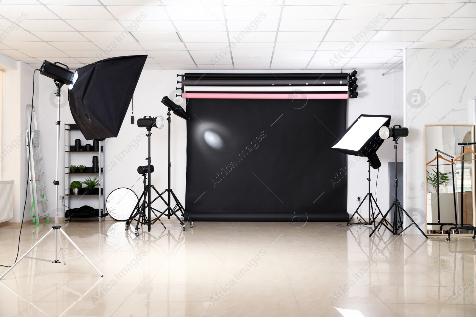 Photo of Photo studio interior with set of professional equipment