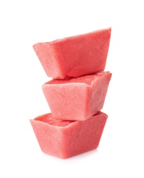 Tasty berry ice cubes on white background