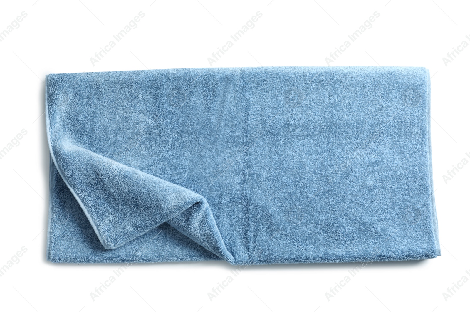 Photo of Soft folded towel isolated on white, top view