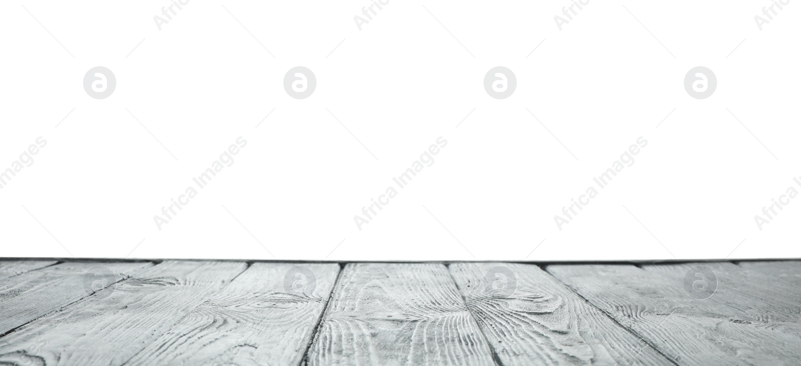 Photo of Empty wooden table surface on white background. Mockup for design