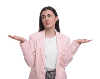 Beautiful young businesswoman standing on white background