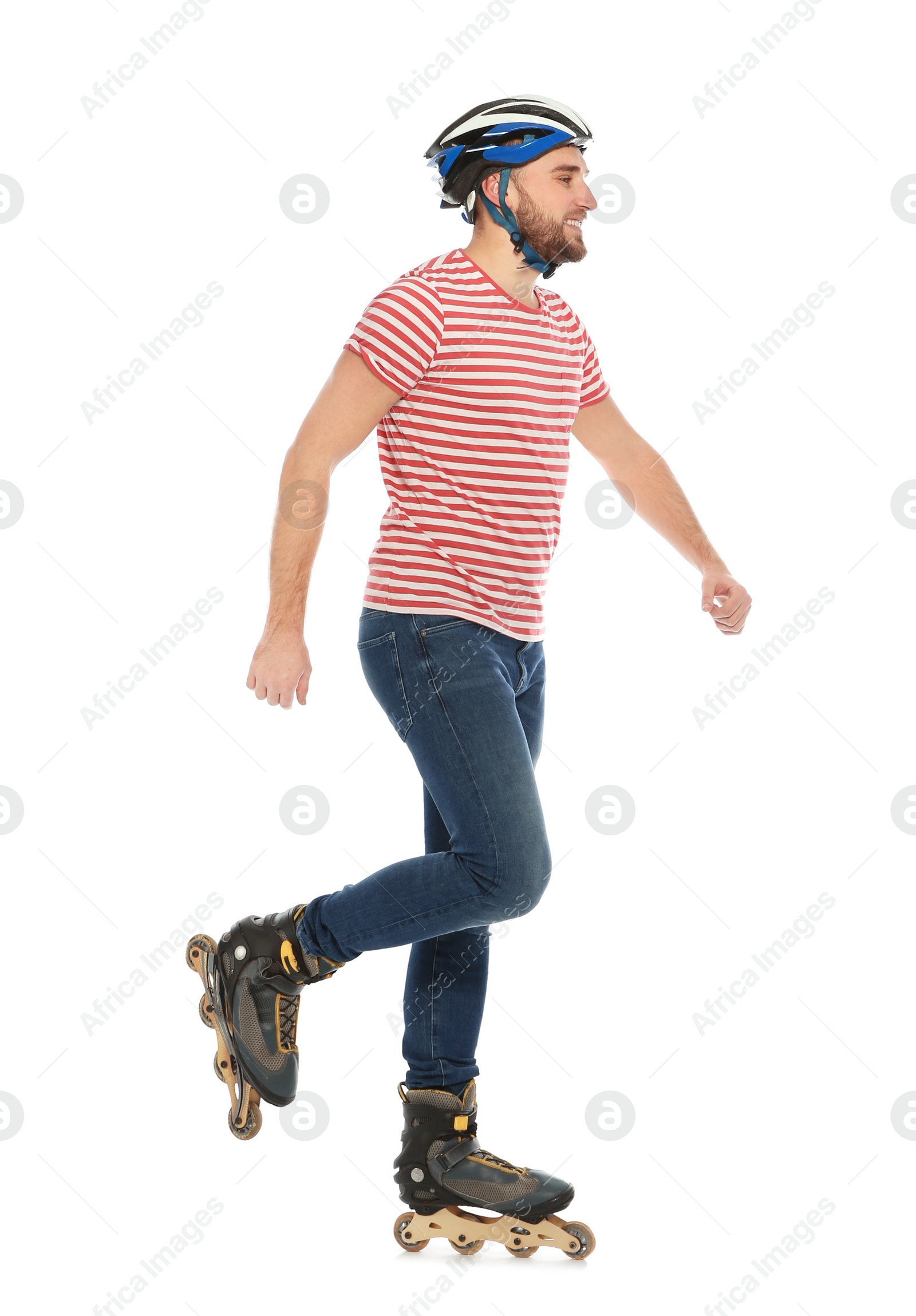 Photo of Young man with inline roller skates on white background