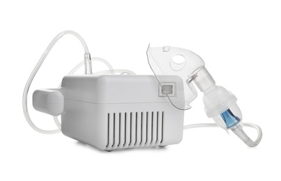 Modern nebulizer with face mask on white background. Inhalation equipment