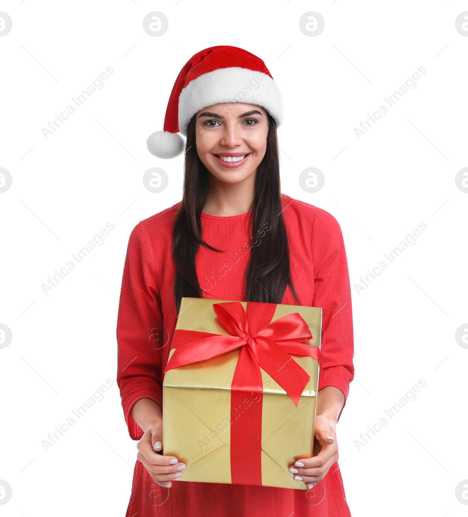 Photo of Happy young woman in Santa hat holding Christmas gift on white background