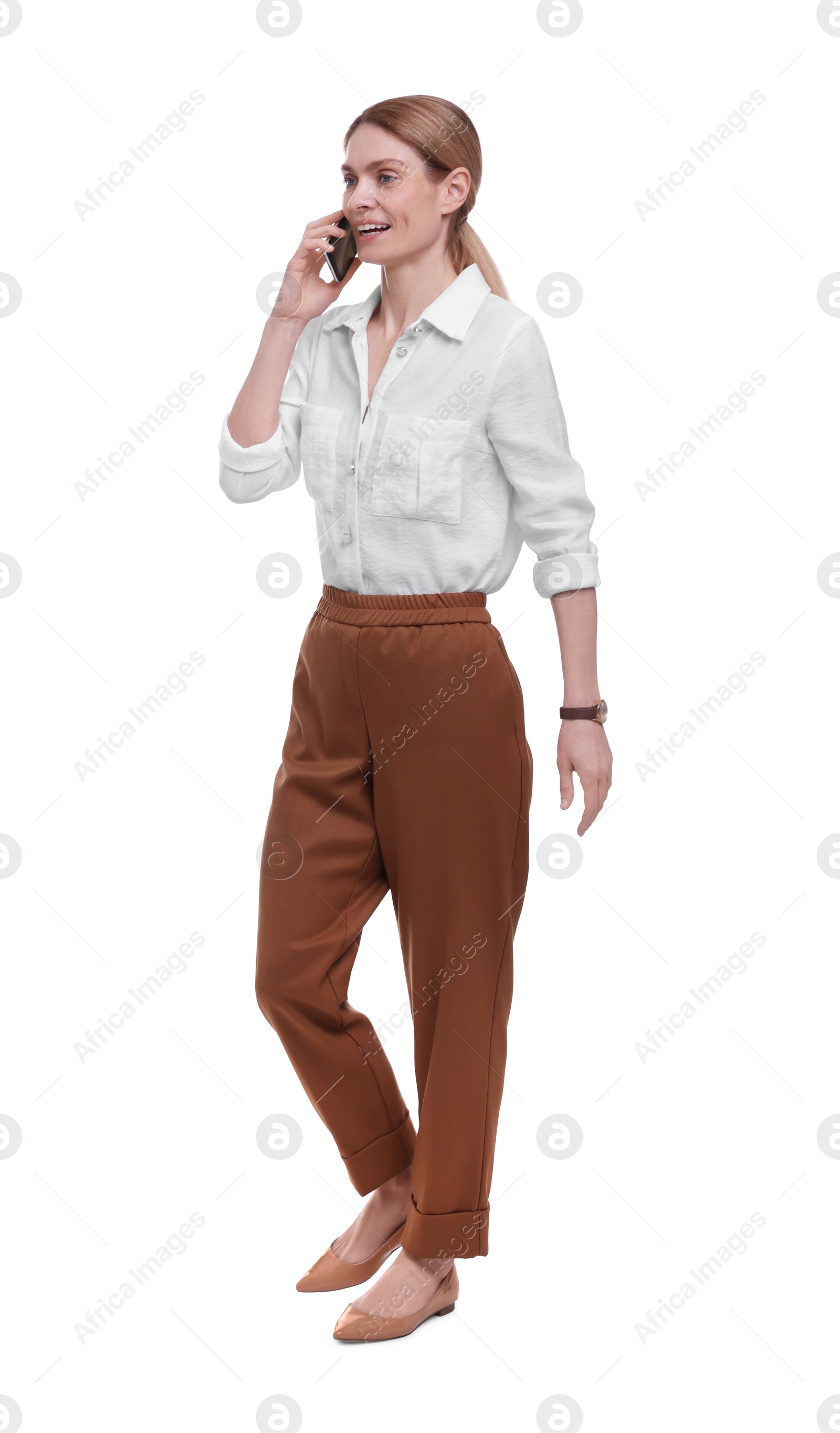 Photo of Beautiful happy businesswoman talking on smartphone against white background