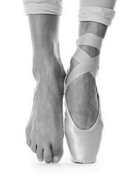 Image of Ballerina in pointe shoe dancing, closeup. Black and white effect