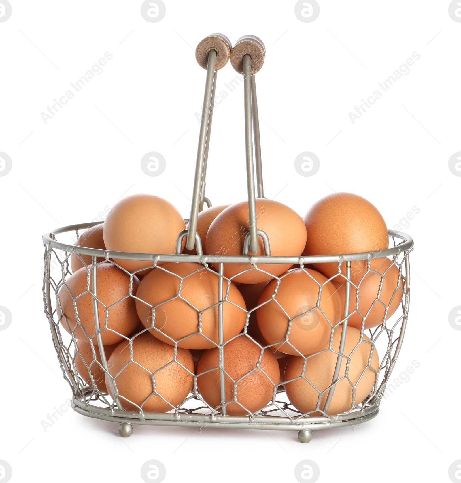 Photo of Chicken eggs in metal basket isolated on white