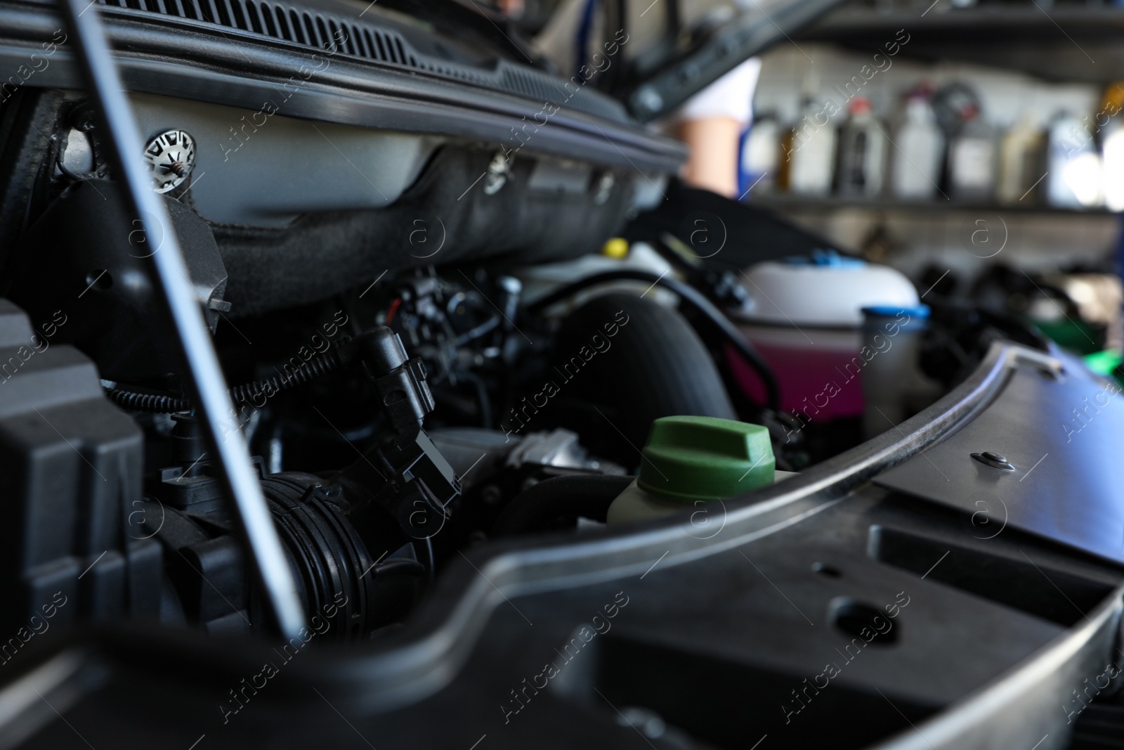 Photo of Closeup view of engine bay in modern auto