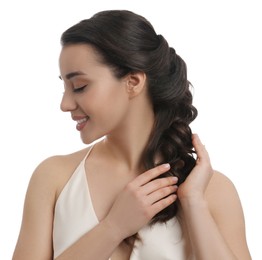 Young woman with beautiful hairstyle on white background