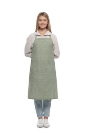 Beautiful young woman in clean apron on white background