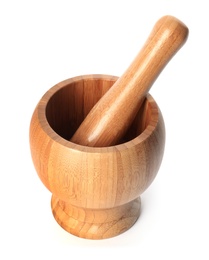 Mortar and pestle made of bamboo on white background