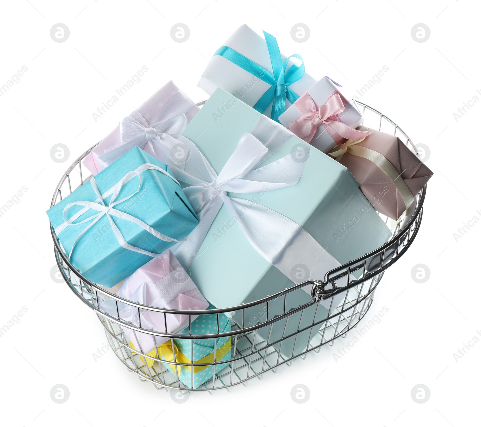 Photo of Shopping basket full of gift boxes on white background