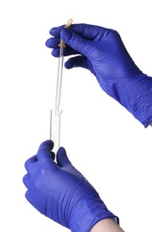 Scientist with pipette and test tube on white background, closeup