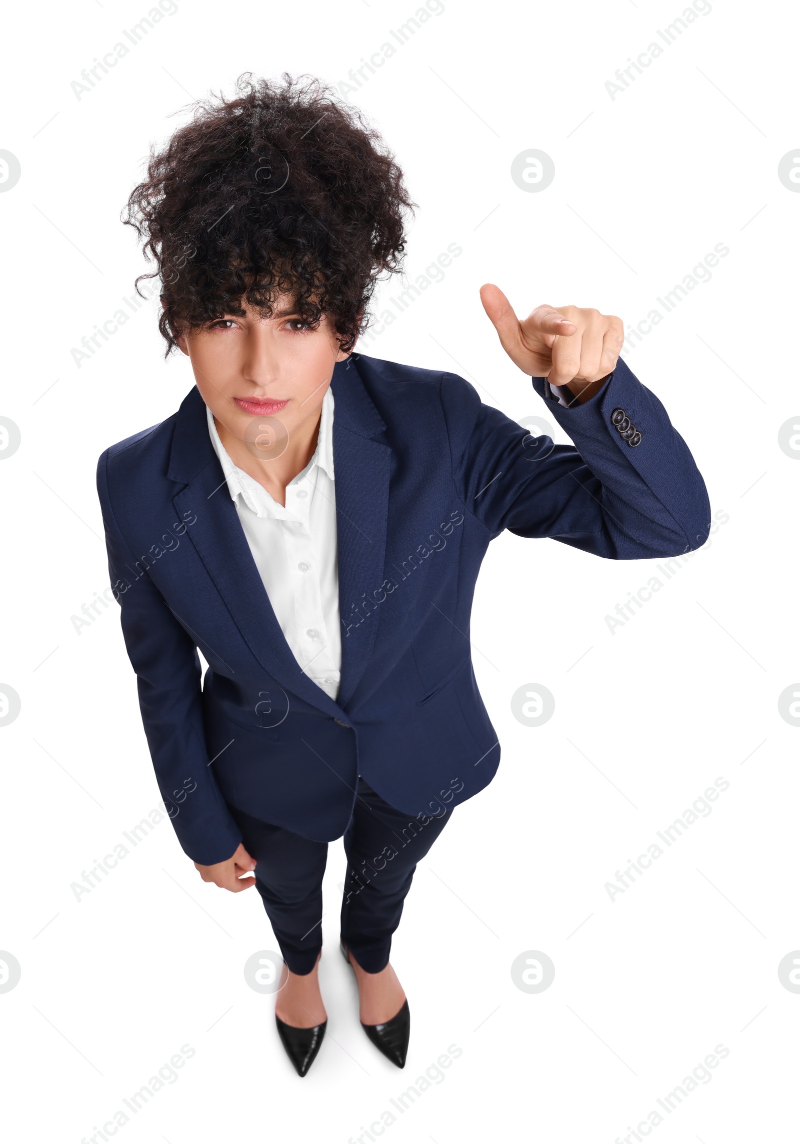 Photo of Beautiful businesswoman in suit pointing at something on white background, above view