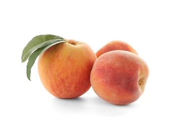 Photo of Fresh sweet peaches on white background