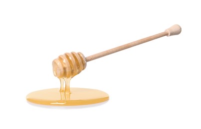 Photo of Natural honey dripping from dipper on white background