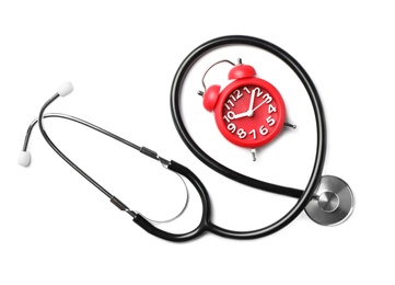 Photo of Stethoscope and red alarm clock for checking pulse on white background, top view