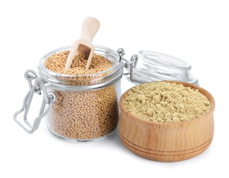 Photo of Aromatic mustard powder in wooden bowl and glass jar with seeds on white background