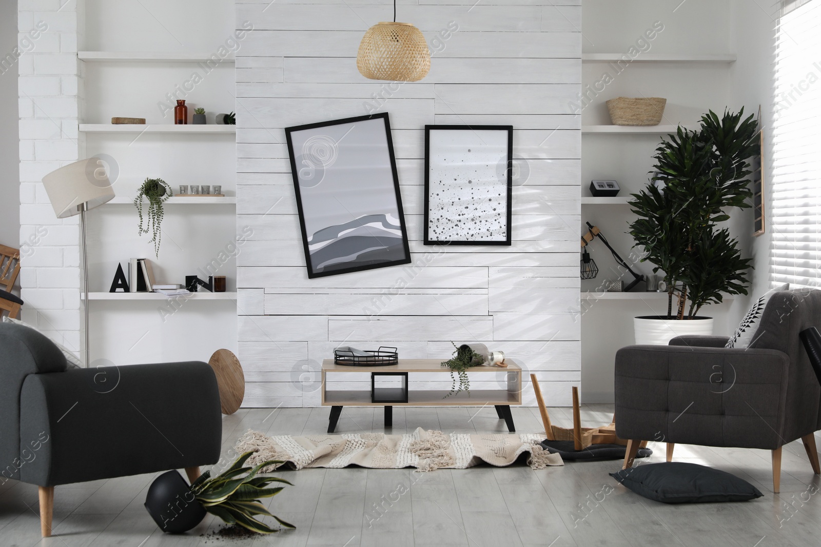 Photo of Chaotic living room interior after strong earthquake