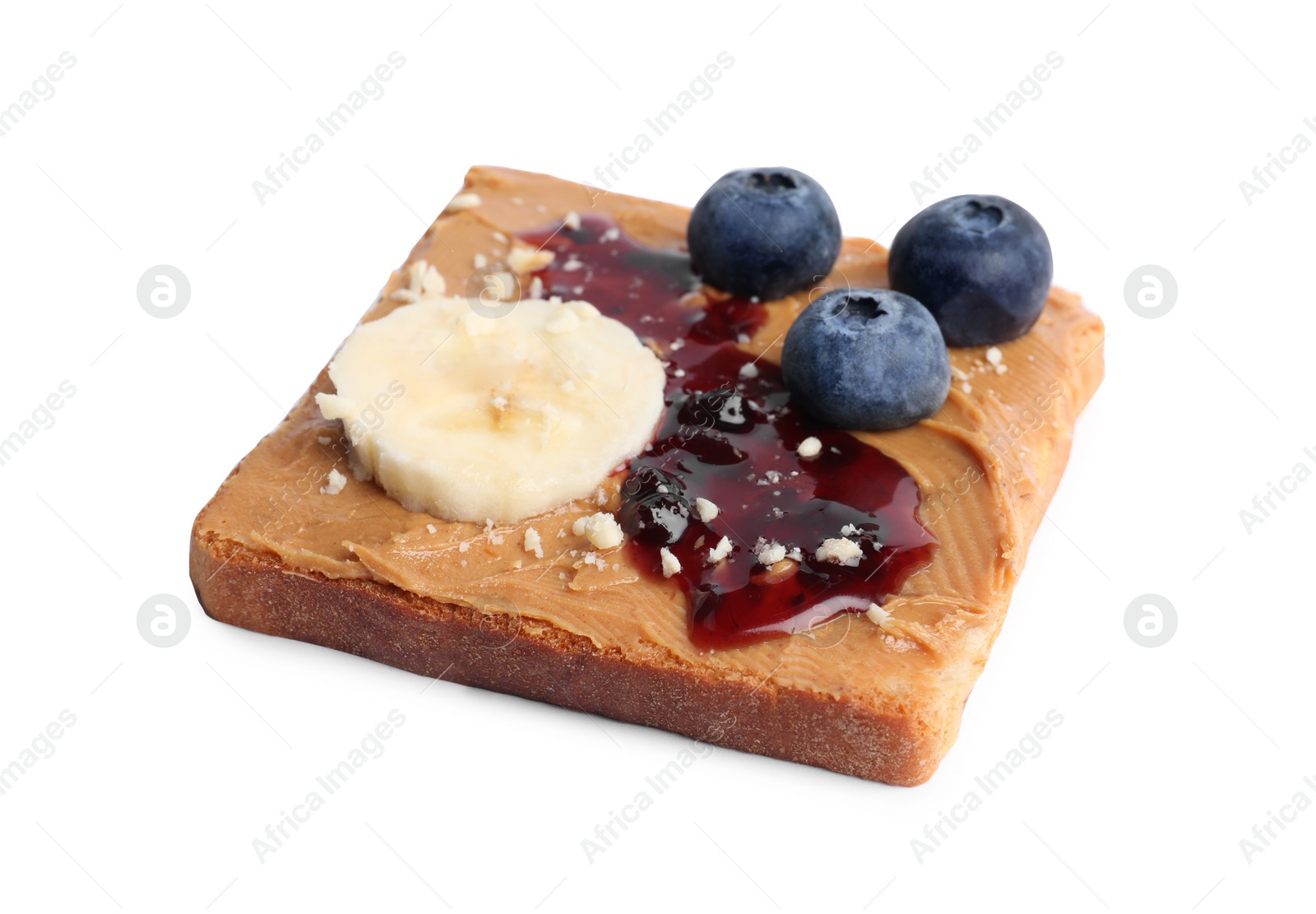 Photo of Toast with tasty nut butter, jam, blueberries, nuts and banana isolated on white