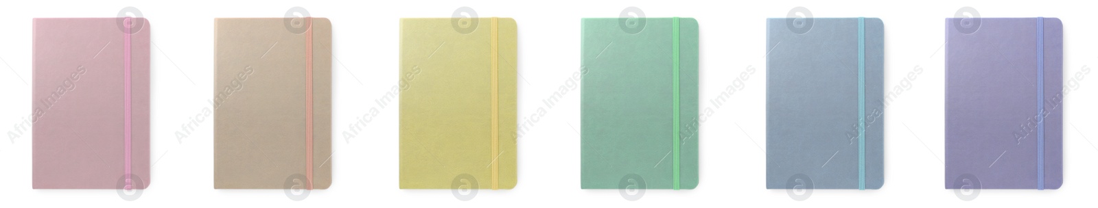 Image of Set with multicolor notebooks on white background, top view. Banner design