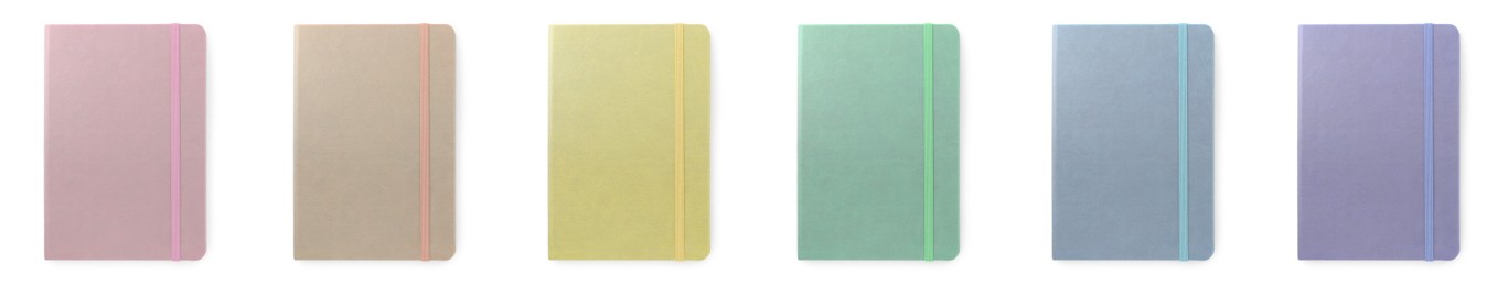 Image of Set with multicolor notebooks on white background, top view. Banner design