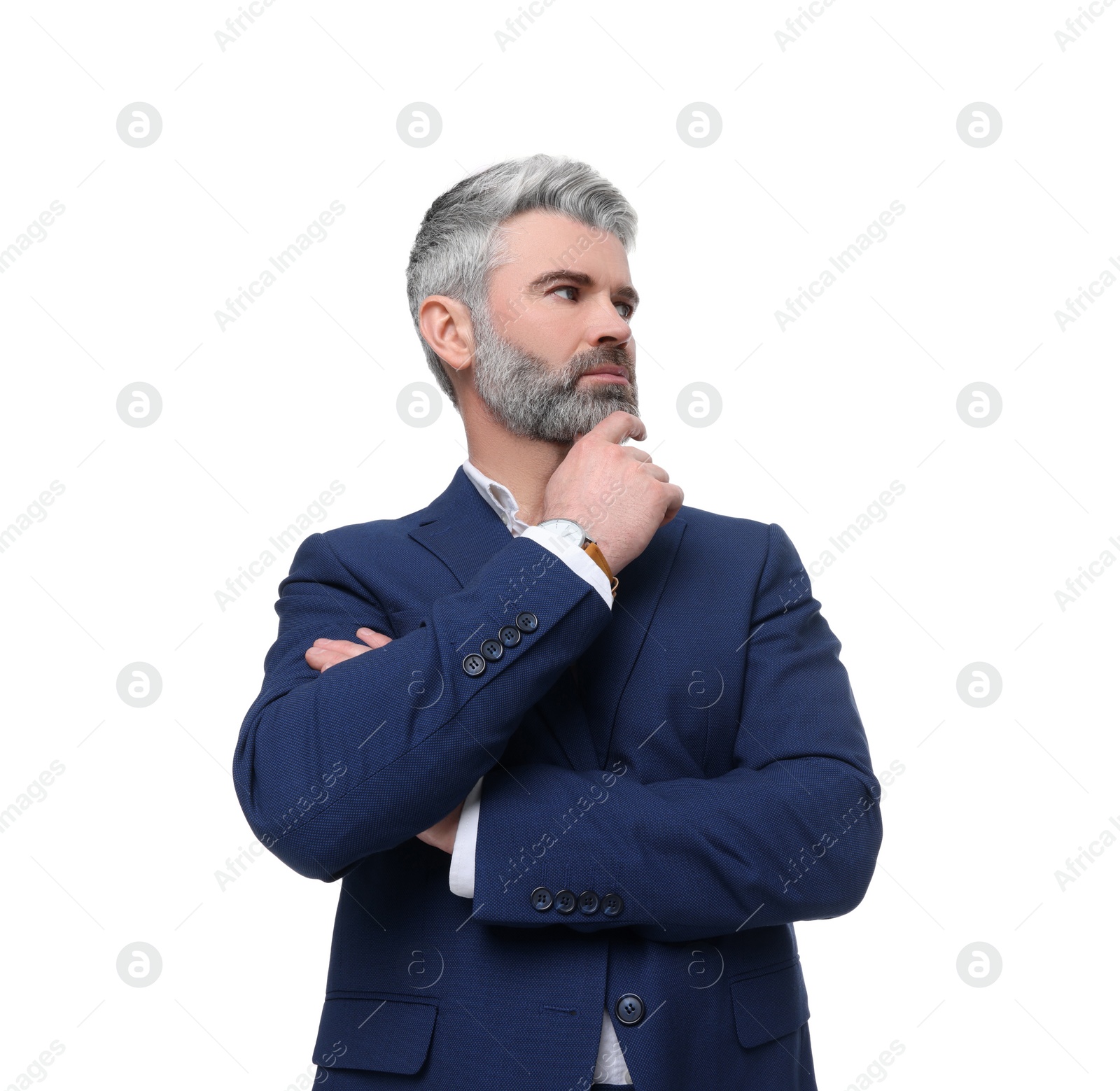 Photo of Mature businessman in stylish clothes posing on white background, low angle view