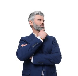 Mature businessman in stylish clothes posing on white background, low angle view