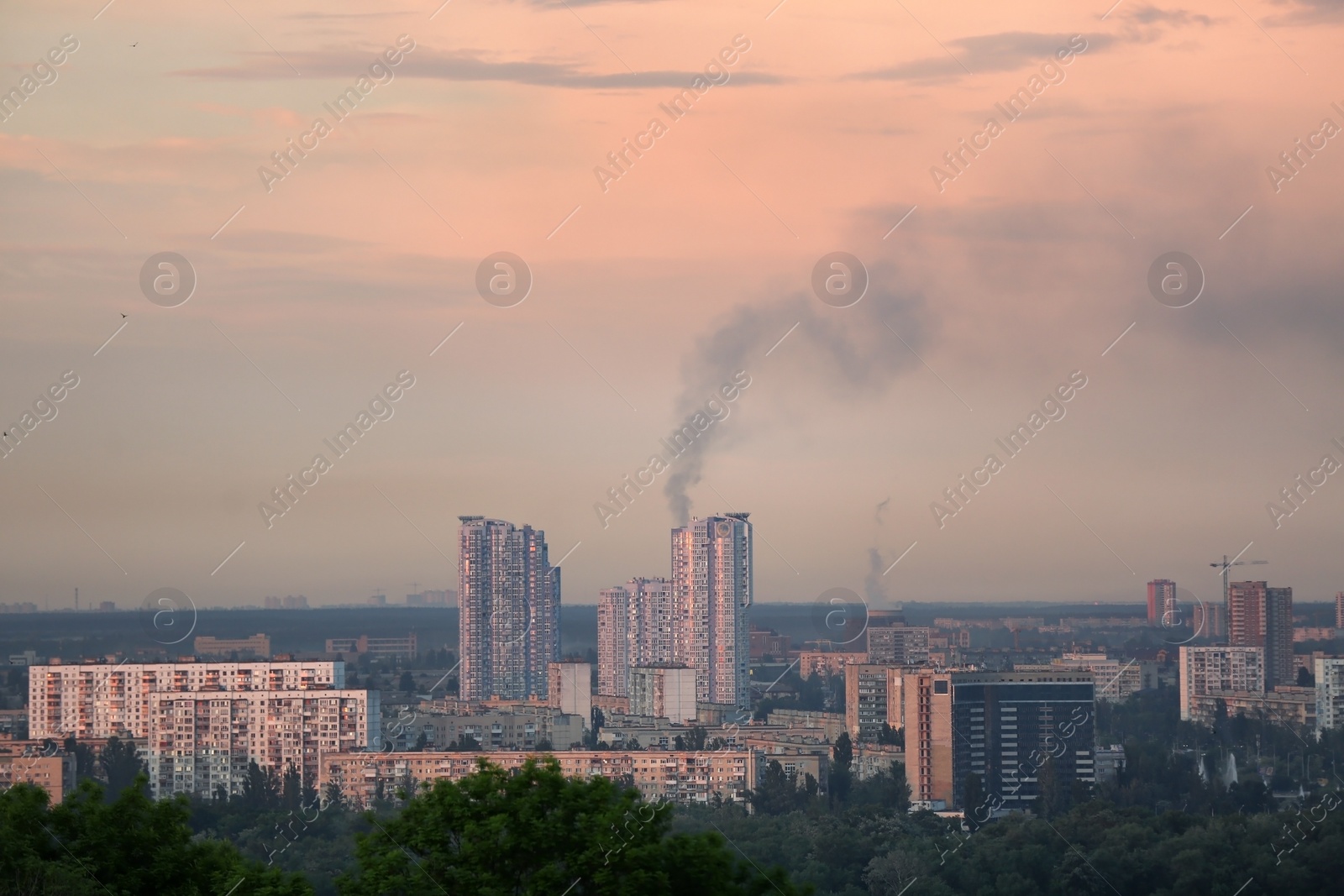 Photo of KYIV, UKRAINE - MAY 23, 2019: City district with modern buildings in evening