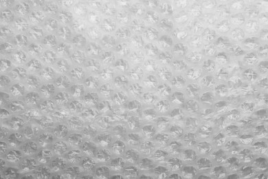 Photo of Texture of bubble wrap as background, top view